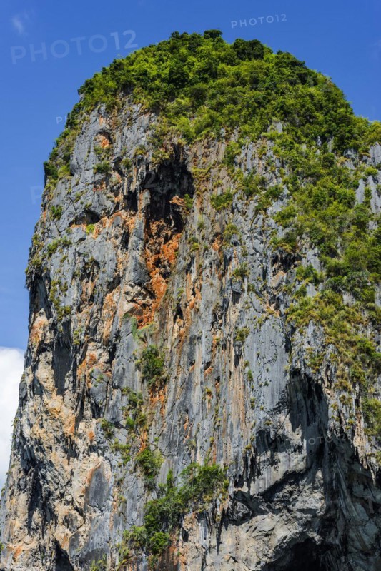 Chalk cliffs near Krabi, weather, sky, climbing rocks, climbing, mountain, hill, mountainous, rainforest, nature, island, travel, tourism, climate, tropical, season, holiday, exotic, sun, sunny, blue sky, travel photo, rock, rocky, sandstone cliffs, coast, coastal landscape, landscape, nature, natural landscape, Siam, paradise, holiday paradise, limestone cliffs, Railay beach, Phuket, Thailand, Asia