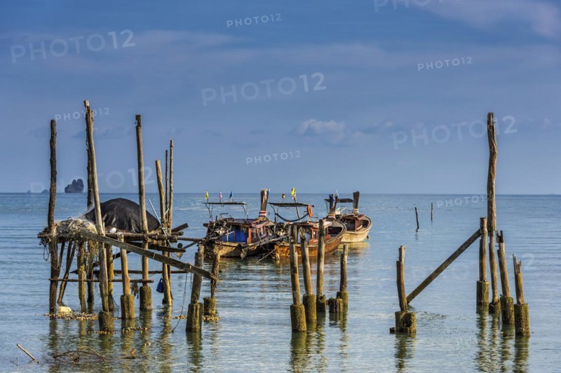 Remains of a jetty at Phang Nga bay near Koh Yao Noi, seascape, seascape, nature, longtail boat, fisherman, fishing boat, locals, work, lifestyle, sky, panorama, limestone, sandstone, holiday, travel, tourism, sun, sunny, climate, water, sea, ocean, poverty, asian, dilapidated, ruin, coast, coastal landscape, paradise, holiday paradise, paradisiacal, boat, island, symbolic, asian, travel photo, exotic, atmosphere, Phangnga, Phuket, Thailand, Asia
