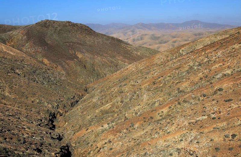Bare moon-like arid landscape in mountains between Pajara and La Pared, Fuerteventura, Canary Islands, Spain, Europe