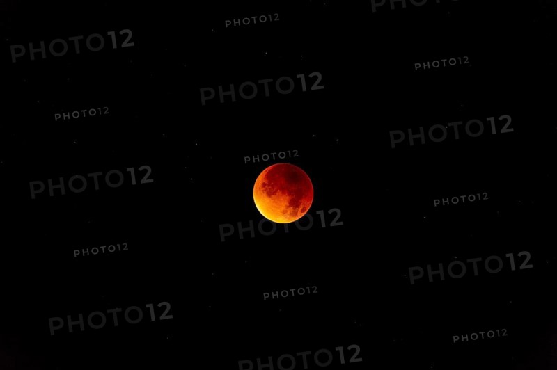 The moon with starry sky, blood moon, taken in the Swiss mountains, Switzerland, Europe