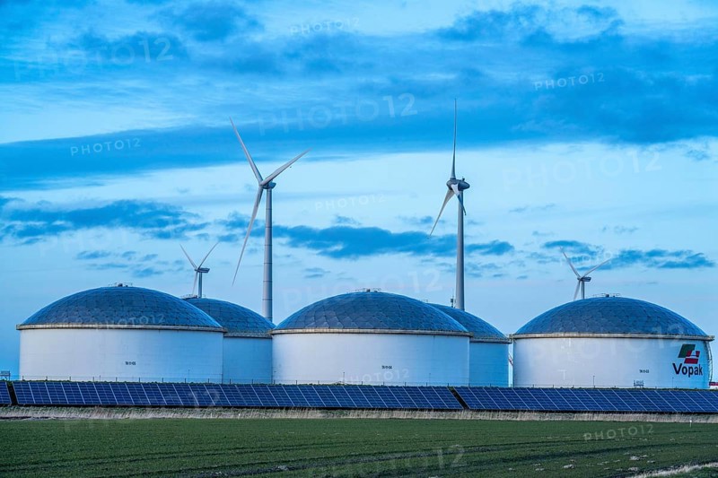Vopak Solarpark Eemshaven, 19 hectares of solar modules with a capacity of 25 megawatts, around the Vopak tank terminal in the industrial harbour of Eemshaven, wind farm, Groningen, Netherlands