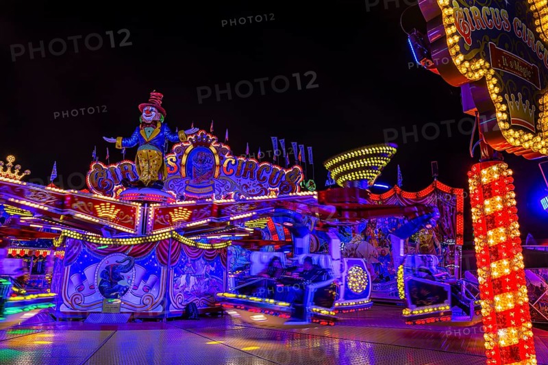 Illuminated round and elevated ride Circus Circus at standstill, night shot, Oktoberfest, Festwiese, Theresienwiese, Munich, Upper Bavaria, Bavaria, Germany, Europe