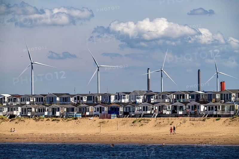 Wind turbines, wind farm, holiday homes, beach houses on the beach of Ijmuiden in North Holland, Netherlands