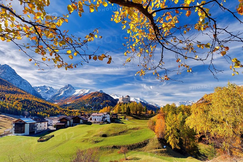 Village view of Tarasp with castle in autumn, Scuol, Canton Graubünden, Switzerland, Europe