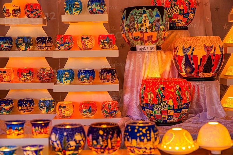 Colourful tea lights in a stall at the Christmas market at City Hall, Vienna, Austria, Europe