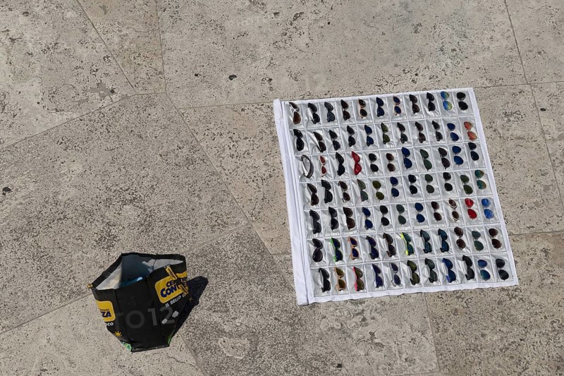 Sunglasses, Ray Ban counterfeits, display from an illegal street vendor in Rome, Italy, Europe