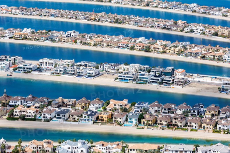 Artificial island in the shape of a palm tree The Palm Jumeirah with luxury villas properties in Dubai, United Arab Emirates, Asia