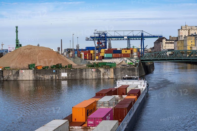 Container freighter Aarburg, leaving the container terminal in Frankfurt Osthafen, belonging to Contargo Rhein-Main GmbH, Hesse, Germany, Europe