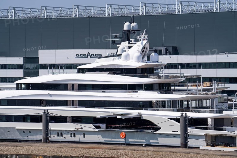 Oceanco shipyard in Alblasserdam, specialising in the construction of mega yachts, luxury yachts, on the river Noord, South Holland, in front the H3 yacht, 105 metres long, completely renovated, rebuilt, behind the superyacht Seven Seas Yacht, 109 metres long, owned by Steven Spielberg, Netherlands