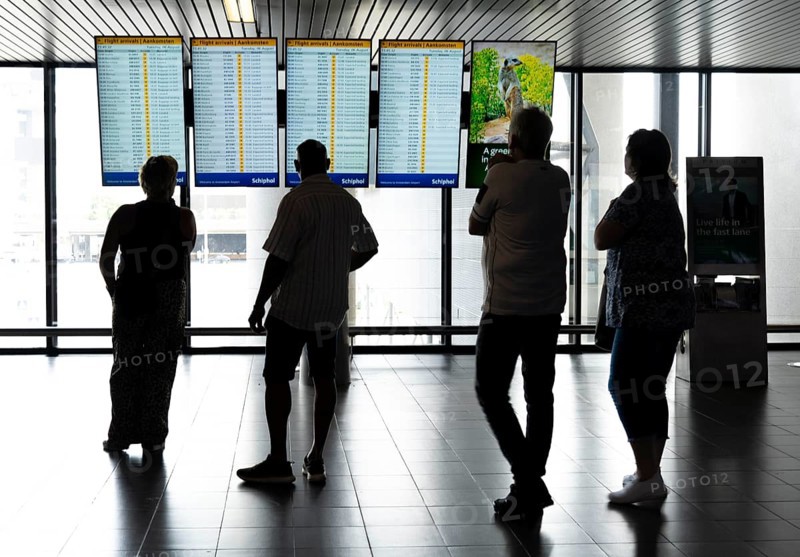 Info screens for departures, arrivals at Amsterdam Schiphol Airport, Terminal, Netherlands
