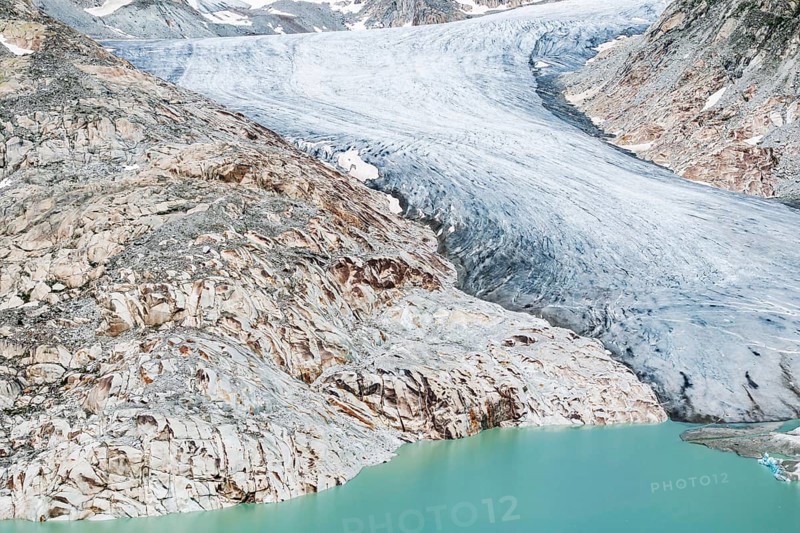 Rhone glacier, valley glacier in the headwaters of the Rhone in the Swiss Alps. Melting glacier, the glacier is getting smaller and smaller. Drone photo. Obergoms, Canton Valais, Switzerland, Europe