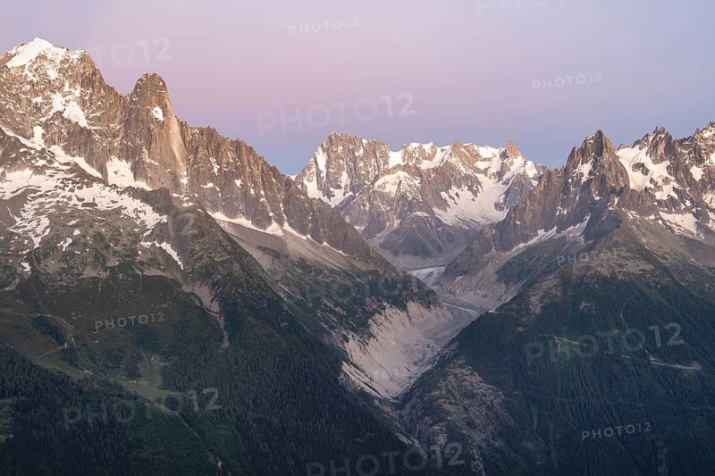 Evening mood with pink evening sky, mountain landscape at sunset, mountain peak Grandes Jorasses and glacier Mer de Glace of the Mont Blanc massif, Chamonix-Mont-Blanc, Haute-Savoie, France, Europe