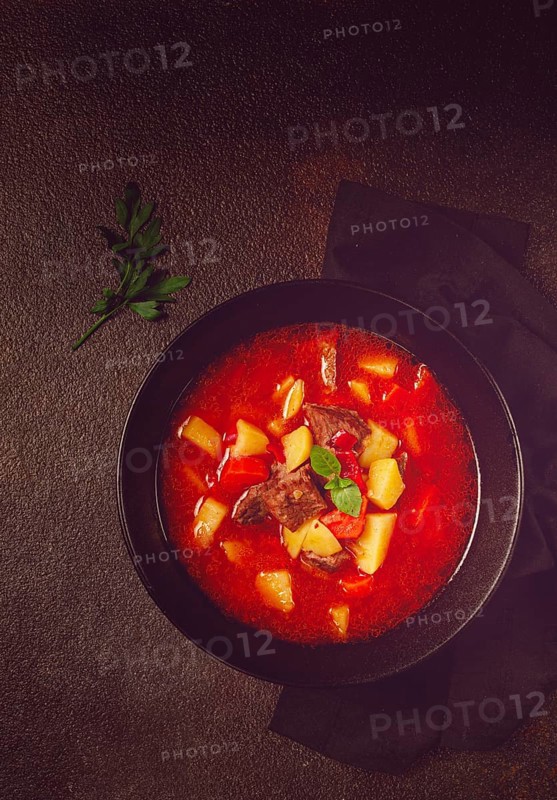 Meat goulash, with potatoes and carrots, sweet pepper, traditional Hungarian soup, homemade, no people