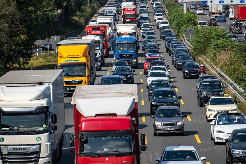 Traffic jam on the A3 motorway, over 8 lanes, in both directions, in front of the Leverkusen motorway junction, Friday afternoon high traffic volume, roadworks, Leverkusen, North Rhine-Westphalia, Germany, Europe