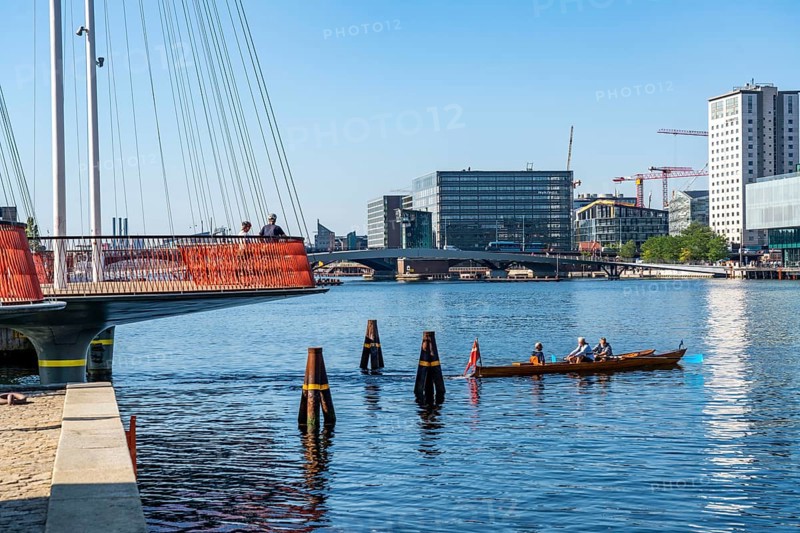 Cyclists on the Cirkelbroen cycle and pedestrian bridge, over the harbour, in the Christianshavens district, Copenhagen is considered the cycling capital of the world, 45 % of the population travel by bike, Denmark, Europe