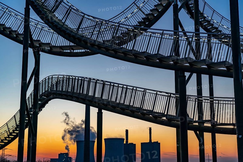 Landmark Angerpark Tiger & Turtle, Magic Mountain, walk-in sculpture in the form of a rollercoaster on the Heinrich-Hildebrand-Höhe spoil tip, HKM steelworks, sunset, Duisburg, North Rhine-Westphalia, Germany, Europe