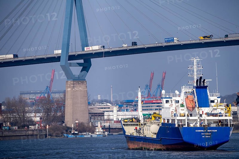 The Köhlbrand Bridge in the port of Hamburg, tanker Cobalt Water, spans the 325 m wide Köhlbrand, an arm of the Süderelbe, the bridge is over 3600 metres long, 53 metres above the water, piers 135 m high, more than 30, 000 vehicles use the B3 bridge daily, important connection to the port, it is dilapidated, to be rebuilt, Hamburg, Germany, Europe