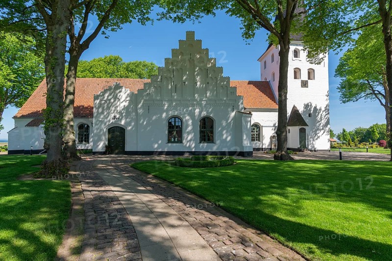 Bogense on the Kattegat, St Nicolas Church, Danish architecture, stepped gables, group of trees, cobblestones, Fyn, island of Funen, Baltic Sea, Denmark, Europe