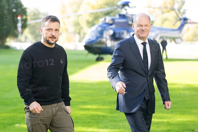 Volodymyr Zelensky (President of Ukraine) is received by Olaf Scholz (Chancellor of the Federal Republic of Germany) after his arrival by helicopter in front of the Federal Chancellery, 11 October 2024