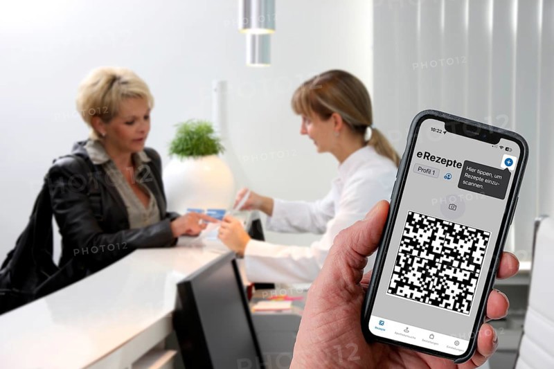 Symbolic image of an e-prescription, prescription issued by a doctor, with QR code, is scanned using a mobile phone and a special app, the code is then shown in the pharmacy and the prescription, which is stored on an IT server, can be retrieved there