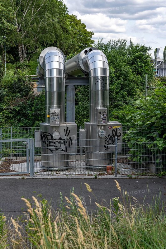 New STEAG district heating pipeline in Essen, over the railway tracks of the S6 line in Essen-Süd, part of the new 12 km long eastern route through the city, North Rhine-Westphalia, Germany, Europe
