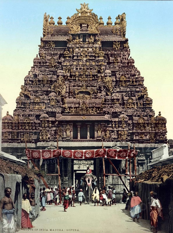 South India. Gopuram or Gopura, a monumental entrance tower, usually ornate, at the entrance of a Hindu temple at Gopura, Historic, digitally restored reproduction from a 19th century original, Record date not stated, South of India. gopuram or gopura, a monumental entrance tower, usually ornate, at the entrance of a Hindu temple at Gopura, Historic, digitally restored reproduction from a 19th century original, Record date not stated