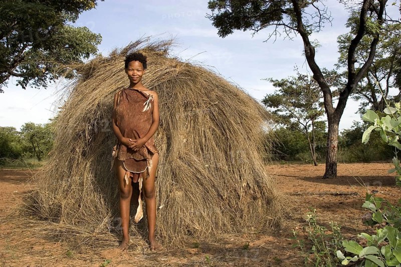 Bushman woman in front of her hut, San, Namibia, Africa