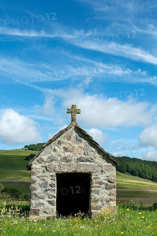 Small chapel in the Cezallier plateau, nestled in the Auvergne Volcanoes Regional Natural Park, Puy de Dome, Auvergne-Rhone-Alpes, France, Europe
