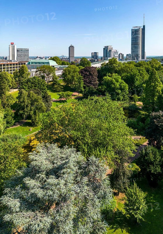 The skyline of Essen city centre, with the RWE Tower on the right and Stadtgarten Park in front, North Rhine-Westphalia, Germany, Europe