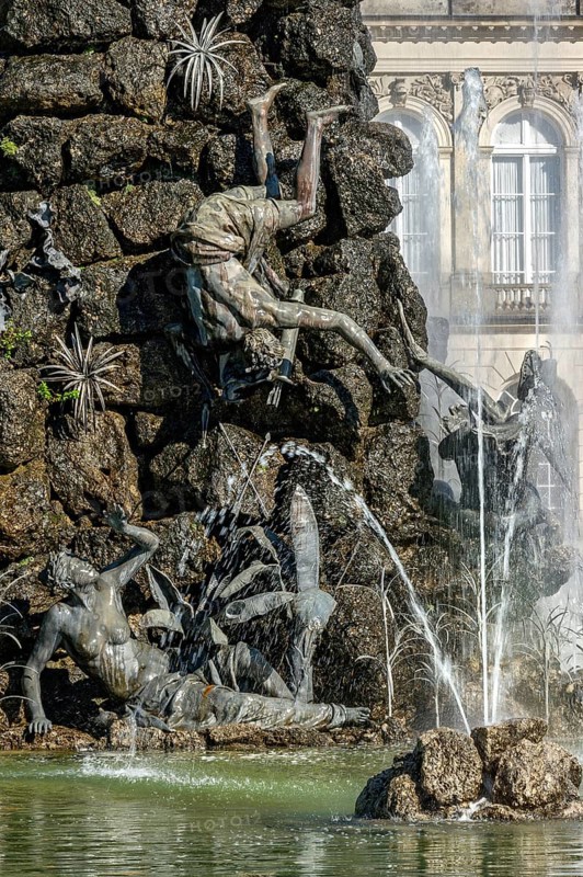 Falling male figure at the Fama Fountain, Fama Fountain, fountain, water parterre, castle park, Herrenchiemsee Castle, Herreninsel, Chiemsee, Chiemgau, Upper Bavaria, Bavaria, Germany, Europe