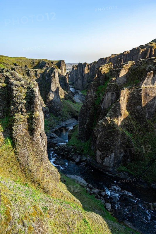 Fjaðrárgljúfur Canyon, Fjadrargljufur, rock formations in rugged deep canyon with river in the evening light, near Kirkjubæjarklaustur, South Iceland, Iceland, Europe