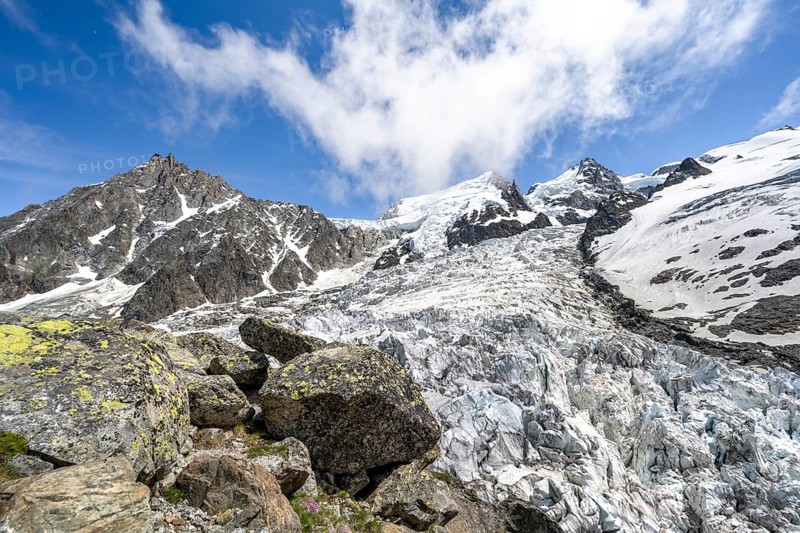 High alpine glaciated mountain landscape, La Jonction, Glacier des Bossons meets Glacier de Taconnaz, summit of Aiguille du Midi, Mont Maudit and Mont Blanc, Chamonix, Haute-Savoie, France, Europe