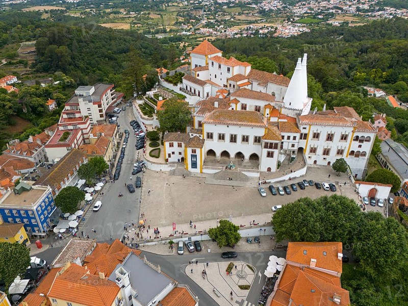 Aerial view of a historic palace surrounded by urban buildings and green areas, Royal Palace, Palácio Nacional de Sintra, National Palace, Sintra, Lisbon, Portugal, Europe