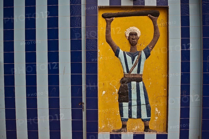 Mural decoration representing a disciple of the Mouride brotherhood Senegal . Mouridism is a muslim brotherhood, a large sufi order mostly present in Senegambia