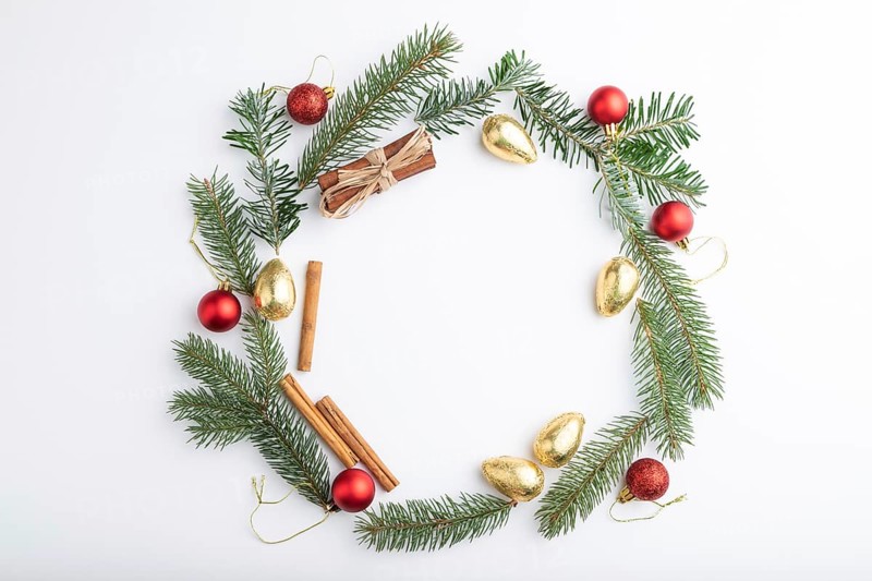 Christmas or New Year wreath composition. Decorations, balls, fir and spruce branches, on white background. Top view, copy space, flat lay