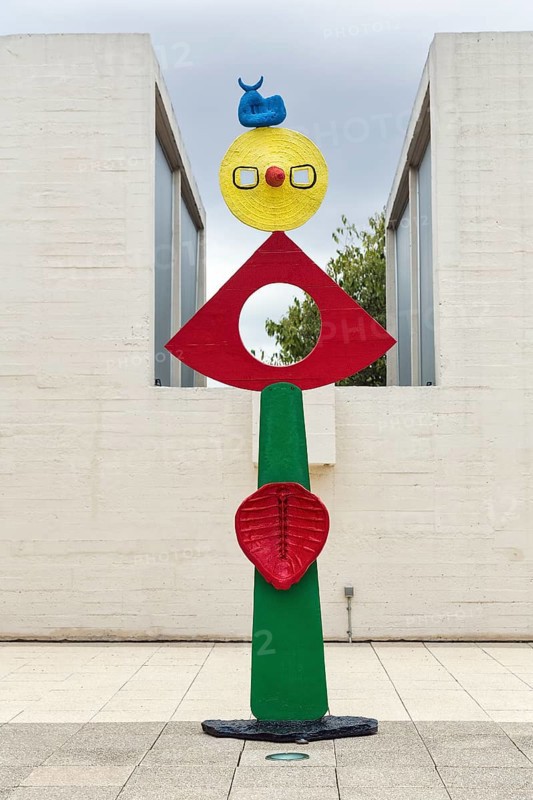 Colourfully painted bronze statue in the Fundacio Joan Miro, Joan Miró, La carícia d'un ocell, CEAC, Montjuic, Barcelona, Spain, Europe