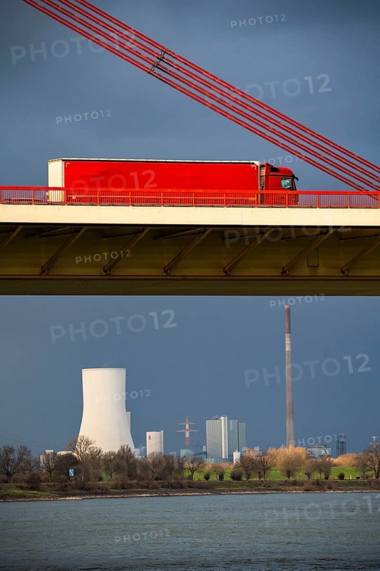 Beeckerwerther Brücke, motorway bridge, A42, truck, cargo ship on the Rhine, behind the STEAG coal-fired power plant Duisburg-Walsum, cooling tower, in Duisburg, North Rhine-Westphalia, Germany, Europe