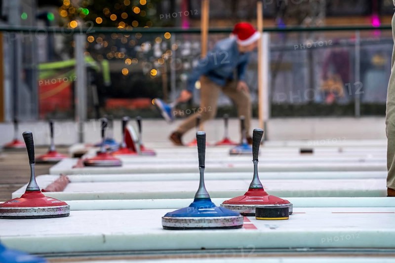 Curling rink at the Christmas market in Düsseldorf, North Rhine-Westphalia, Germany, Europe