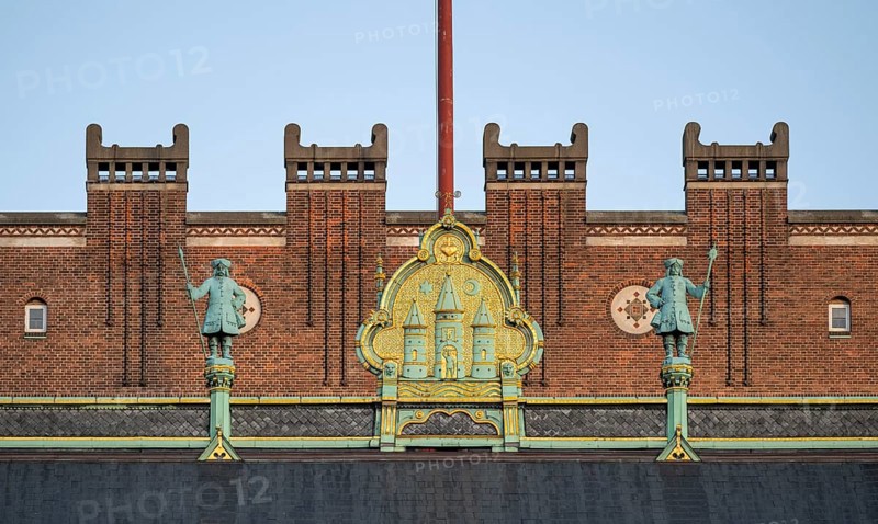 Brick façade with gilded city coat of arms, town hall in the National Romantic style by Martin Nyrop, Town Hall Square, Rathausplatz or Rådhuspladsen, Copenhagen, Denmark, Europe