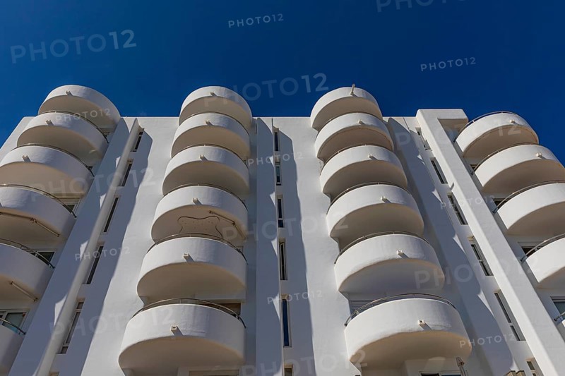 Modern holiday flats with round balconies at the harbour of Santa Eularia, Ibiza, Balearic Islands, Mediterranean Sea, Spain, Europe