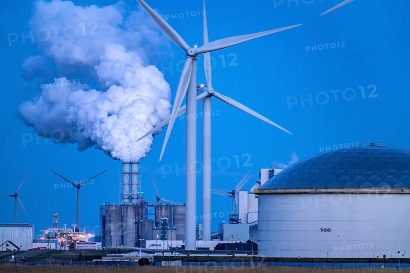 Vopak tank terminal in the industrial harbour of Eemshaven, RWE coal-fired power plant Eemshavencentrale, wind farm, Groningen, Netherlands