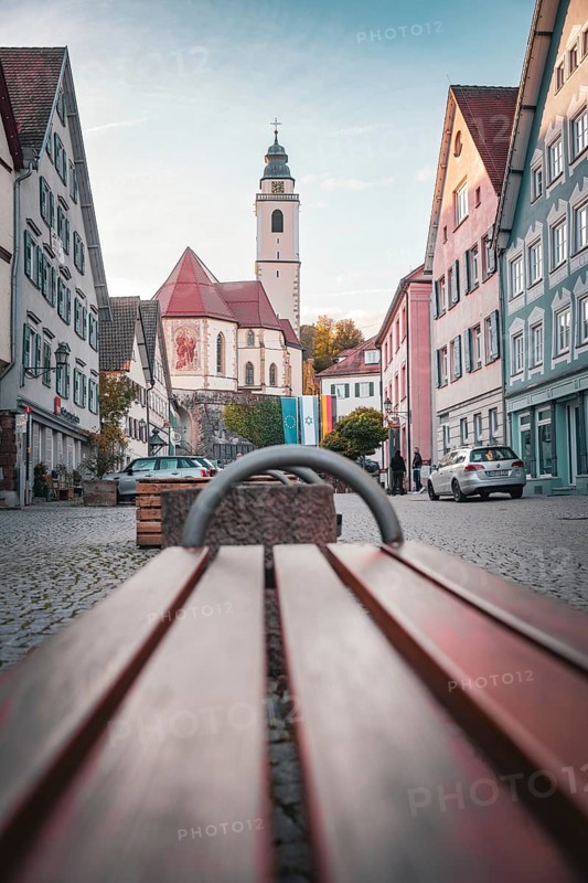 Old town with church and bench on cobblestones in the morning light, Horb, Black Forest, Germany, Europe