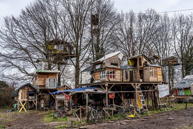 Camp of climate activists in the rest of the village of Lützerath, the last place to be excavated at the Garzweiler 2 open-cast lignite mine, North Rhine-Westphalia, Germany, Europe