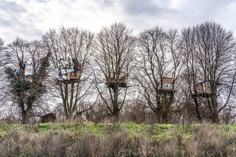 Camp of climate activists in the rest of the village of Lützerath, the last place to be excavated at the Garzweiler 2 open-cast lignite mine, North Rhine-Westphalia, Germany, Europe