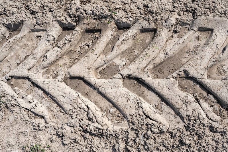 Tyre imprint of a heavy agricultural machine on soil, field, soil compaction, soil damage, Hegau, Baden-Württemberg, Germany, Europe