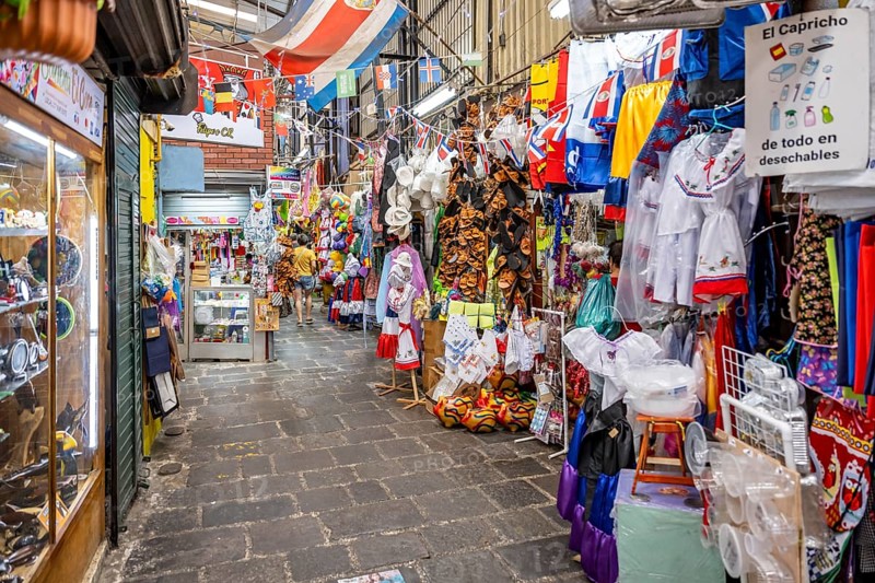 Alley in the market hall, stalls with colourful displays, Mercado Central de San José, San José, Costa Rica, Central America