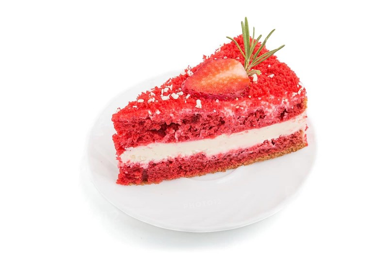 Homemade red velvet cake with milk cream and strawberry isolated on white background. side view, close up