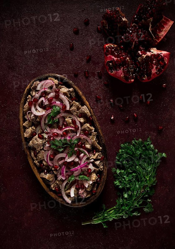Kuchmachi, Traditional Georgian cuisine, chicken giblets appetizer, with spices and pomegranate seeds, on ketsi, no people, homemade