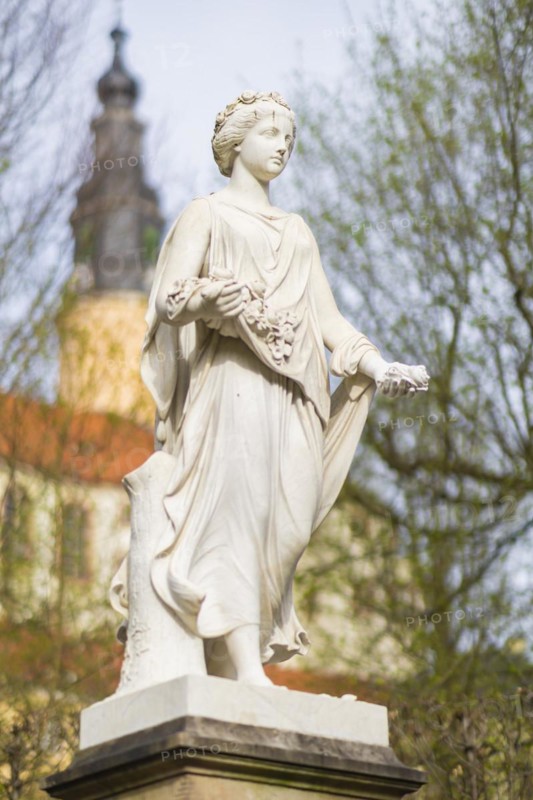 Weesenstein Castle Park. Roman flower goddess Flora (goddess of flowers and blossoming) made in 1861 by the Saxon sculptor Wolf von Hoyer, Weesenstein, Saxony, Germany, Europe
