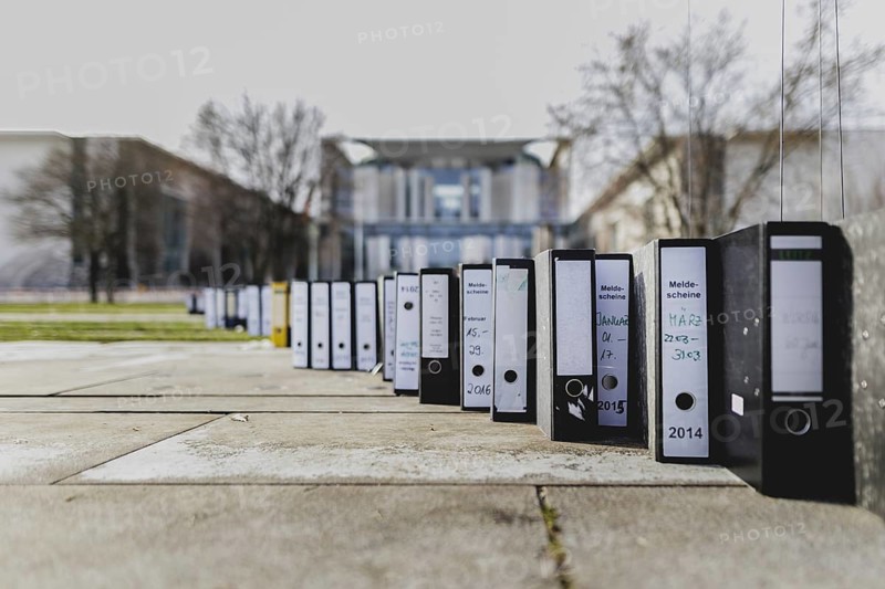 File folders stand in front of the Federal Chancellery as part of a protest action by the German Confederation of Skilled Crafts in Berlin, 26 February 2024. The German Confederation of Skilled Crafts demonstrates against the economic policy of the Federal Government as well as the high level of bureaucracy and the improvement of location conditions